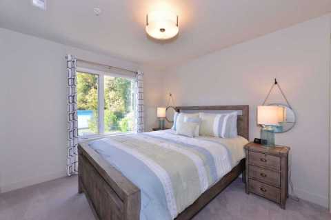Serene second bedroom with Queen size bed.