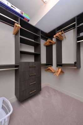 Very large and well equipped walk in closet in the Master Bedroo