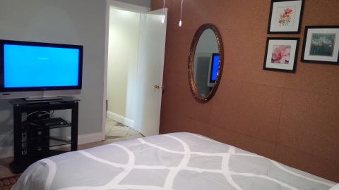 Plasma TV on bedroom