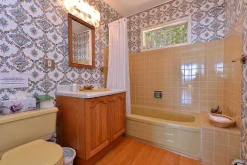 Four piece bathroom located on the main level of the home